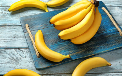 Yummy,Bananas,On,Wooden,Background Yummy,Bananas,On,Wooden,Background